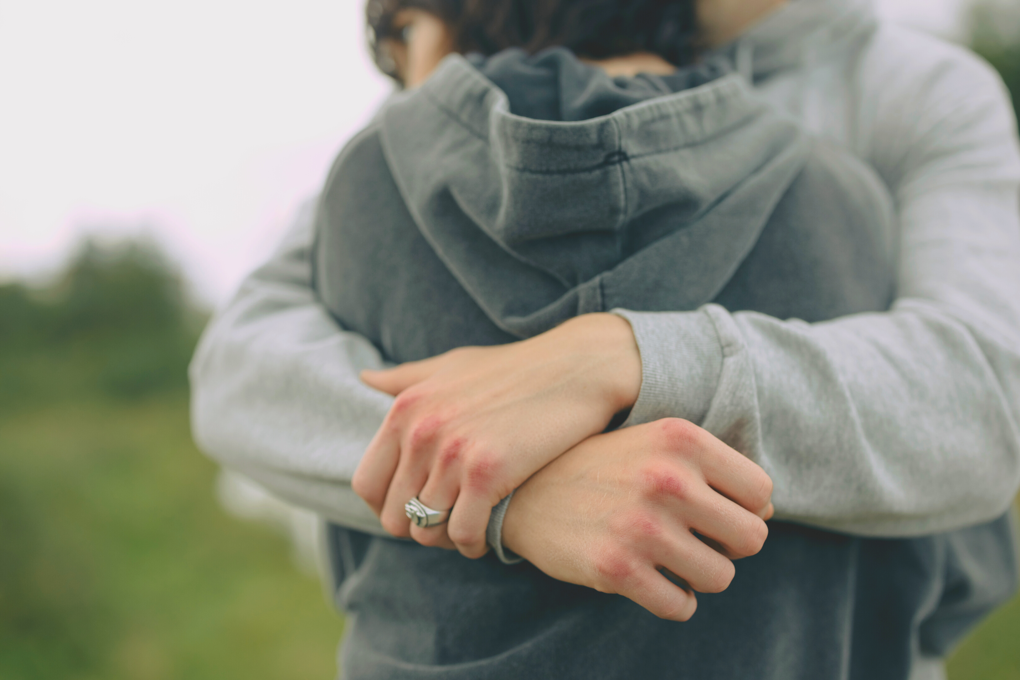 A Close-Up Shot of a Couple Hugging Each Other